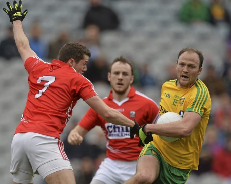 Colm McFadden, Donegal, in action against Tomás Clancy of Cork.