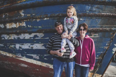Neilie Kavanagh. fisherman, with daughter Muireann and wife Donna.