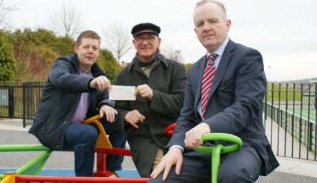 Charity man, Fintan Houston, presenting yet another cheque.