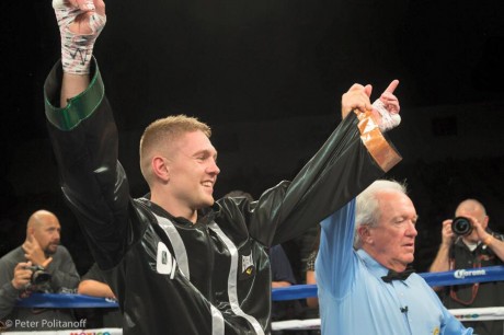 Jason Quigley's arm is held aloft by referee Pat Russell after his win over Joshua Snyder. 