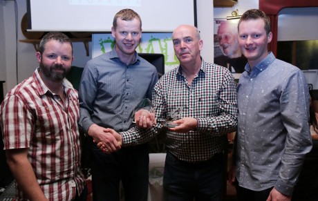 Neily Mc Bride, Derrynamansher (2nd from left) was the overall winner of the WAAR 53k challenge in West Donegal on Saturday and he is pictured receiving his award from Tom Marry, Chairman, Naomh Muire GAA Club. Also included are organisers Brian O'Donaill and Gavin O'Donaill.