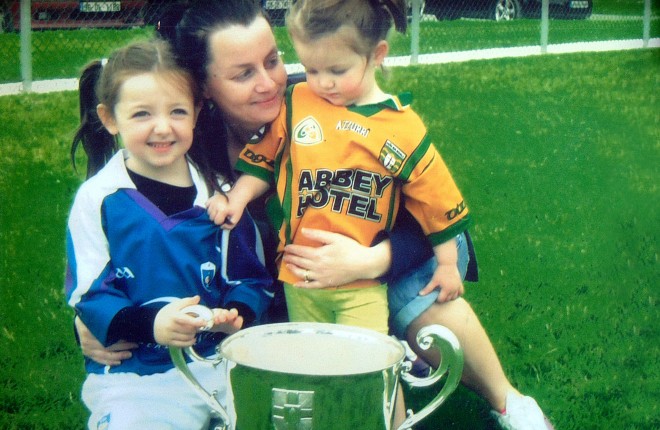 The late Melissa Hamilton with her daughters Jessica (left) and Darcey with the Anglo Celt cup after the Ulster Champions visited the Red Hughs GAA Club in 2012. She passed away less than two months after this picture was taken.