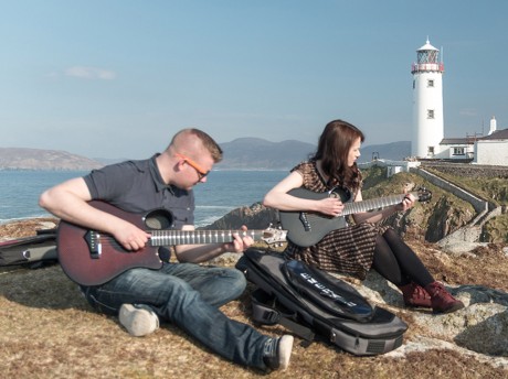 Simon McCafferty and Karen Kelly jamming on Emerald Guitars at Fanad Lighthouse. Photo: Alan McLaughlin