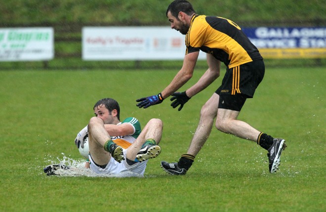Caolan Kelly, Glenswilly in action against  Anthony Kelly of Malin. Photo: Donna El Assaad