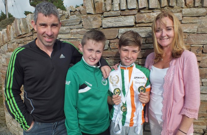 Three time Irish Champion, Adam McGeever pictured with his dad,  Con, mum, Leigh and brother, Joey.  Photo: Tommy Curran