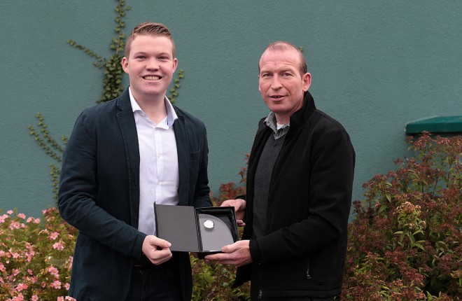 Ryan Ferry presents the Donegal News Sports Personality of the Month Award for August to Ramelton athlete Kieran Murray.