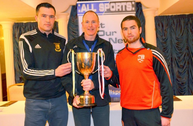 Bundoran captain Tommy Hourihane, the referee Connie Doherty, and the Naomh Colmcille skipper Gerard Curran.