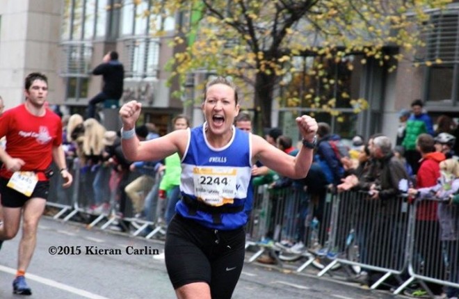 Finn Valley AC's Margaret Reid celebrates completing the Dublin Marathon. Photo: Kieran Carlin.