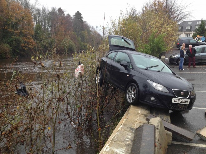 Another car almost swept away from Jackson's car park.