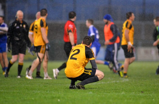 A devastated Jamie Brennan looks on at the final whistle in the Intermediate Ulster final at Owenbeg.