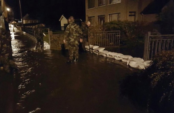 Members of the Army on sand bag duty on Saturday night. Pic courtesy of the Irish Defence Forces