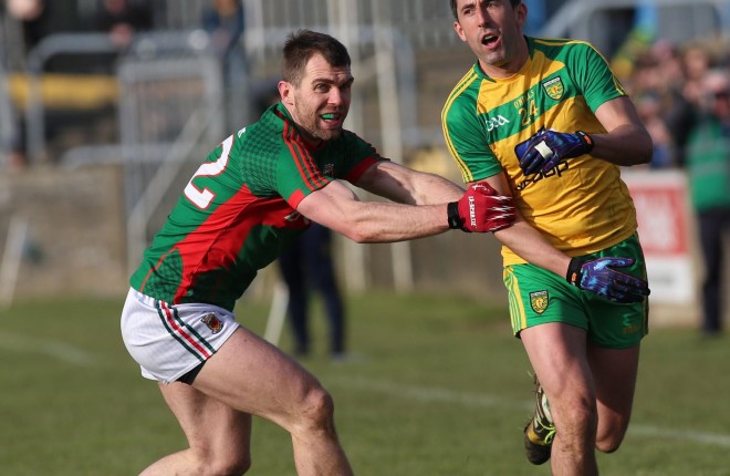 Rory Kavanagh under pressure from Seamus O'Shea