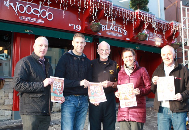 Jason and Sharon from Voodoo Venue sponsors of the Letterkenny Athletic Club's Turkey Trot 5K Fun Run pictured accepting the sponsorship on behalf of the LAC are Brendan McDaid, Danny McDaid and Neily McDaid