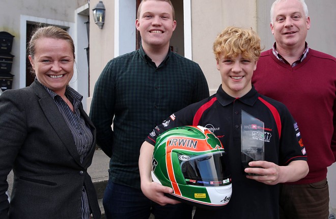 Rhys Irwin collects the Sports Personality of the Month award for March from Doreen Gallagher, Ryan Ferry, and Harry Walsh of the Donegal News. Photo: Declan Doherty.