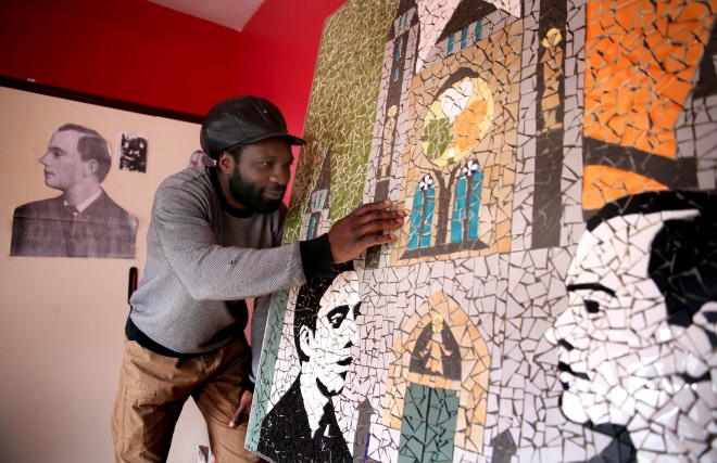 Mocola Vonga puts the finishing touches to his 1916 Centenary mosaic.