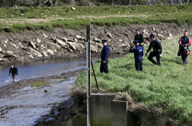 Gardai and divers search the river Swilly near Port Bridge, Letterkenny this afternoon.