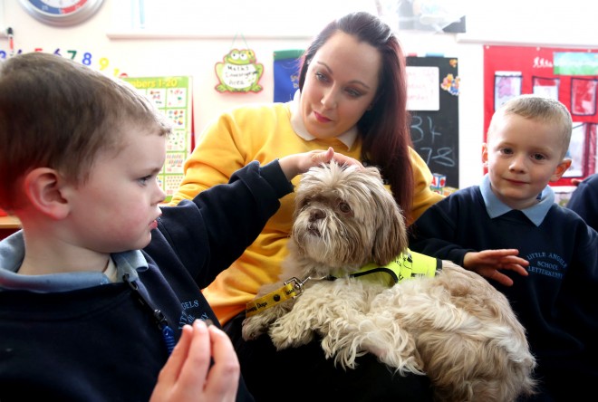 Little Angels School pupils Killian Roulston and Ryan Meehan meeting Sara Kavourmas and 'Loui'.