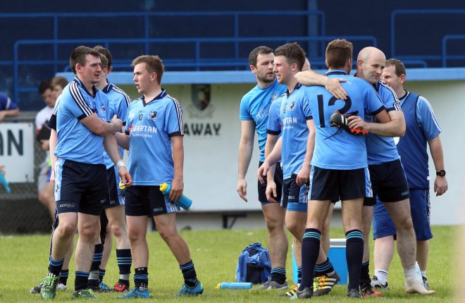 Milford celebrate after their defeat of Four Masters to bring them top of the table.