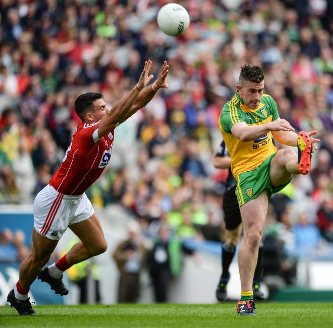 Star man for Donegal Patrick McBrearty who scored 11 points in action against Tom Clancy of Cork. Photo: Sportsfile