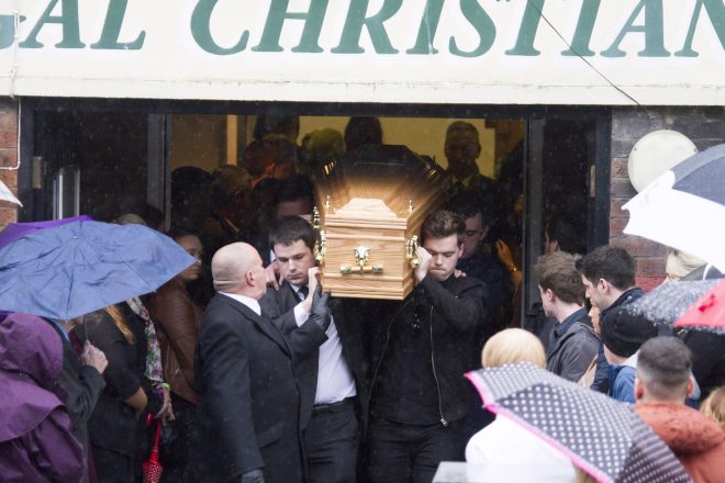 The remains of Stevie Martin are carried from the Christian Fellowship church in Derry by his brother Sean (front right) and friends.  (North west Newspix)
