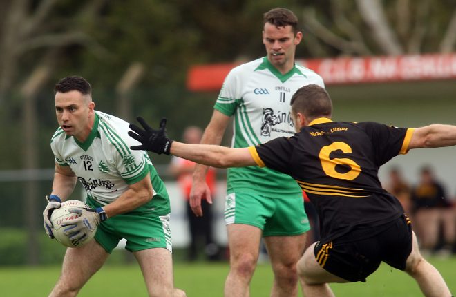 Diarmuid McInerney in possession for Aodh Ruadh against Dermot Gallier of Naomh Ultan during the Intermediate Championship in Fintra on Saturday.