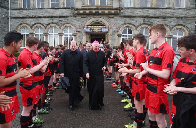 Bishop Philip Boyce makes his way to the opening of the St. Eunan's College pitch yesterday (Thursday).
