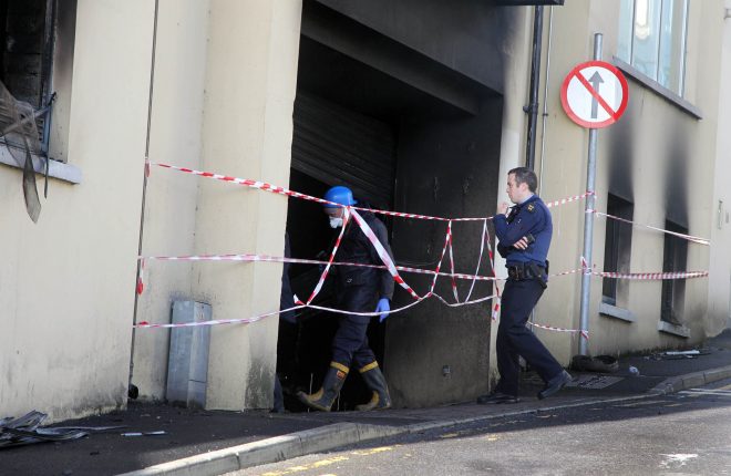 Garda forensics investigate the fire in a car-park on Rosemount Lane. Photo: Donna El Asssaad