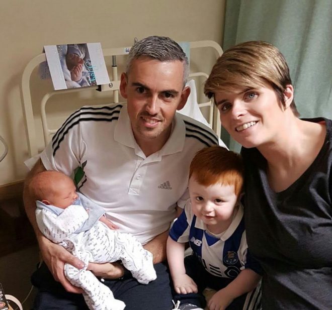 Caolan Melaugh with his parents, Gerard and Stacey and new baby brother Eoghan.