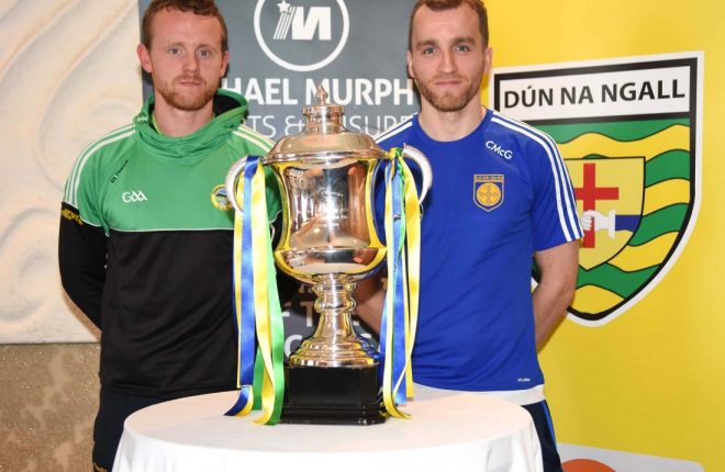 Glenswilly captain Gary McFadden and Kilcar skipper Ciaran McGinley, with the Dr Maguire Cup