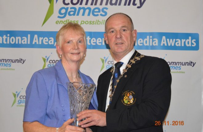 Mary O'Donnell Milford being presented with her National Adult Volunteer award by President Gerry Davenport at the Community Games Awards function in Galway.