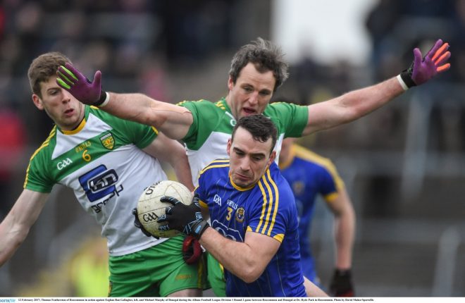 Roscommon's Thomas Featherstone under pressure from Michael Murphy and Eoghan 'Ban' Gallagher.