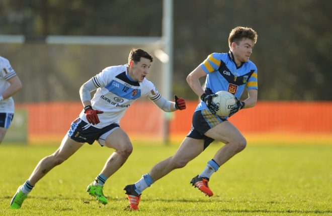 Eoin McHugh chases after Conor McCarthy in the Sigerson Cup on Wednesday.