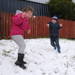 Clodagh McTaggart and Martin Ward having fun in the snow on Tuesday morning. Photo: Donna El Assaad