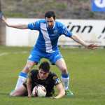 Jamie McGrath, Dundalk takes a tumble against Gareth Harkin, Finn Harps.