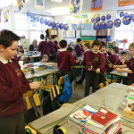 Pupils at Scoil Cholmcille making St Bridgid's Crosses on Wednesday.