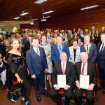 Dr. Gerry Lane and Hugh McBride (seated) at the Mayor's Civic Reception with guests and family.