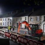 The last few metres of the High Road water pipe laying contract are completed in the early hours of Wednesday morning at St. Columba's Terrace.