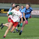 Katy Herron, Glenfin charges forward and scores Glenfin's decisive goal against Tara Hegarty, Moville. Photo: Donna El Assaad