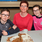 Jane, Matthew, and Megan McGettigan enjoying some scone bread at the Donegal Hospice Coffee Morning in An Craoibhinn, Termon.