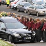 Pupils from PCC Falcarragh form a guard of honour at the funeral of Daniel Scott at Christ the King Church, Gortahork.