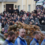 Mourners arrive for the funeral of the late Shaun Harkin in Gortahork.