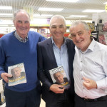 Joe Kelly, John Carr and Patsy McGonagle, with Paty's book Relentless.